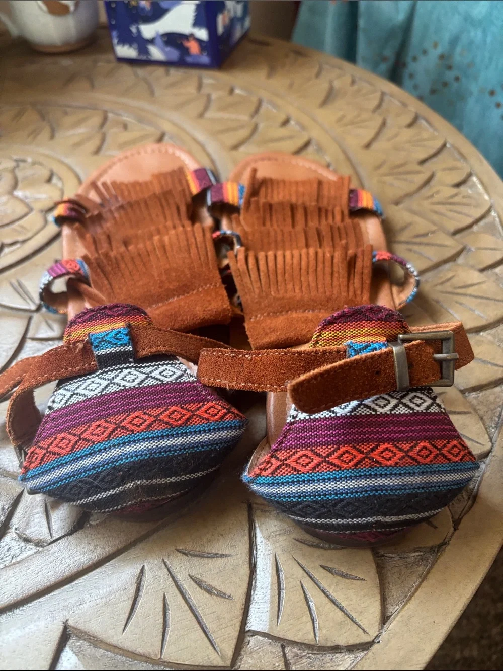 Minnetonka Fringed Suede Women’s Sandals with Woven Accents